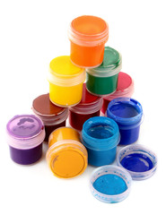 Colorful vibrant cans of gouache isolated on white