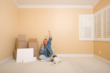 Excited Woman on Phone Near Boxes and Blank Signs