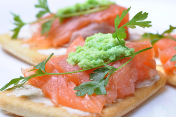 smoked salmon with wasabi  on cracker isolated