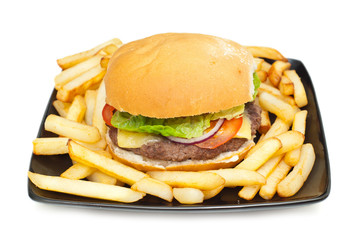 burger and chips on a plate isolated on white background