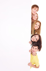 Group of happy people holding banner.