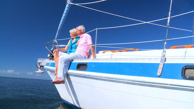 Mature Couple Enjoying Yachting Relaxation filmed at 60FPS