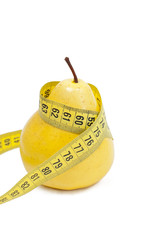 Yellow pear wrapped in yellow centimeter on a white background