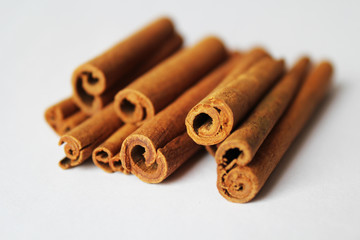 Cinnamon sticks on a white background