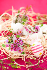 Pink flowers in eggshells
