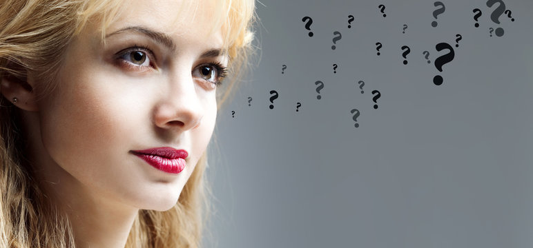 Beautiful  thoughtful young woman, questions