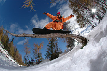 Jumping snowboarder
