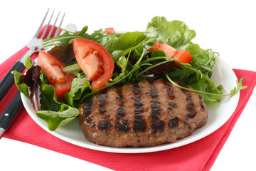 grilled turkey hamburger with vegetable salad