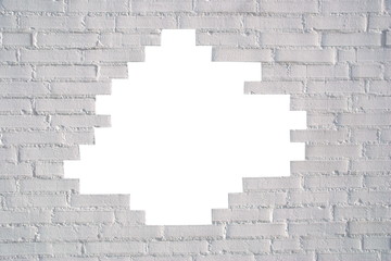 weiße Mauer mit Loch
