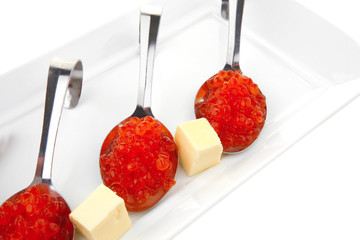 salmon caviar on spoons