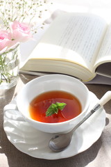 Herbal tea and book