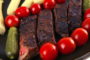 roast beef with tomatoes and corns