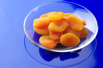 Dried apricots on plate