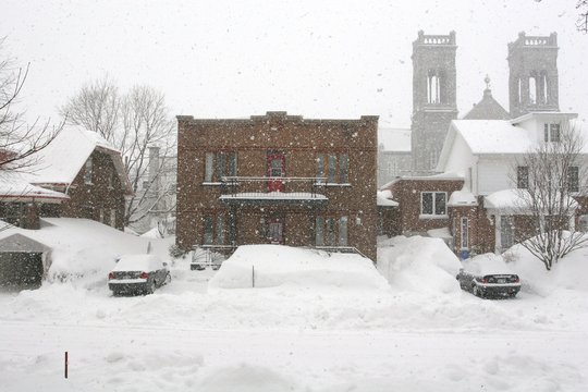 Residential quarter in Quebec City during a snowstorm (blizzard), Quebec, Canada