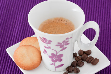 an elegant cup of coffee with biscuits