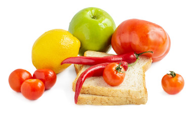 Green apple,bread,lemon and tomatoes