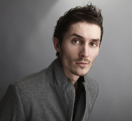 Obraz premium Young man's face. Close-up portrait.