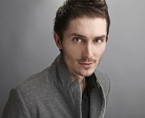 Young man's face. Close-up portrait.