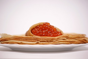 Pancakes with red caviar