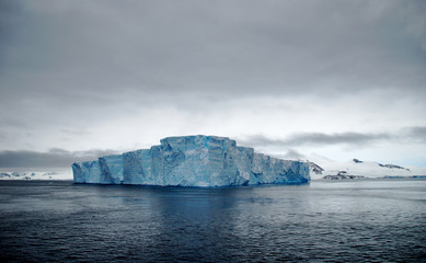 tabular iceberg in ocean