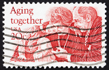 Postage stamp USA - circa 1982, Senior and children together
