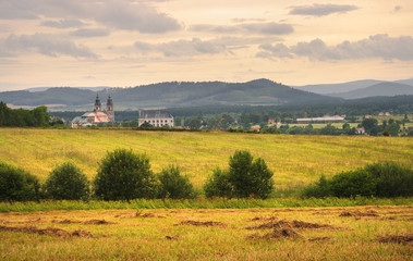 Autumn view with basilica in old village