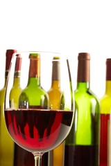 Wine Bottles and Glass of Red Wine