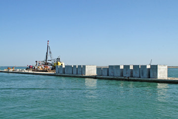 concrete blocks placed on a construction dam site