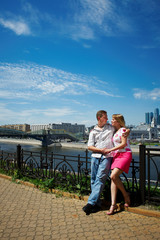 Fototapeta premium Young happy man and woman at romantic walk