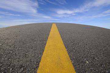 Road curve and blue sky