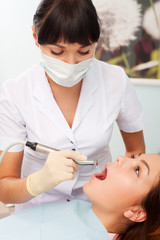 Obraz na płótnie Canvas working dentist with patient