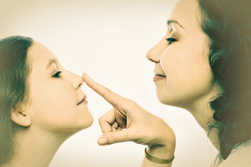 Obraz premium Mother and daughter playful portrait