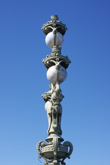 Fototapeta na wymiar decorative lantern on a background blue sky