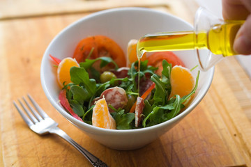 Salad sprinkled with oil.