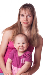 Mother with daughter sitting together