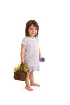 Sweet girl with flower basket
