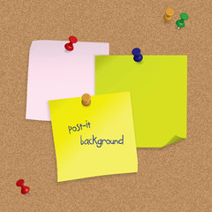 Post-it notes with 3D pushpins on cork board