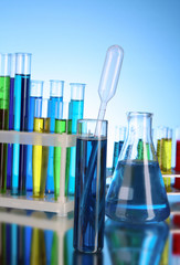 Test tubes on blue background