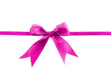 Pink ribbon and bow isolated on white background