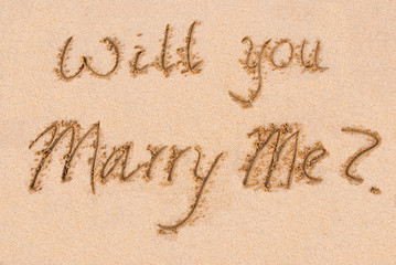 Will you marry me? - written on the sand