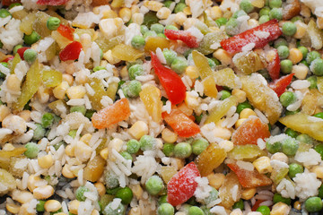 frosted rice with sweet corn and peas with selective focus