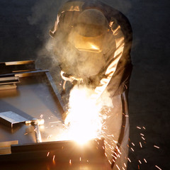 Welder with welding sparks