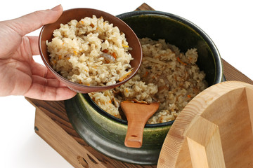 serving takikomi gohan (japanese mixed rice)