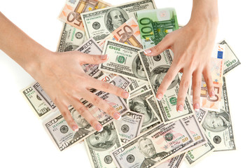 Female hand with money  isolated on a white background