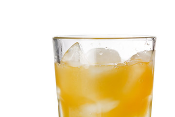 glass of orange juice with ice
