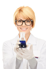 lab worker holding up test tube