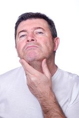 Fototapeta premium man looking beard before shaving