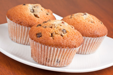 Muffins on a white plate