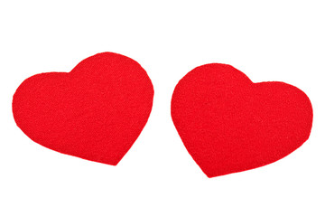 Two red textile hearts isolated