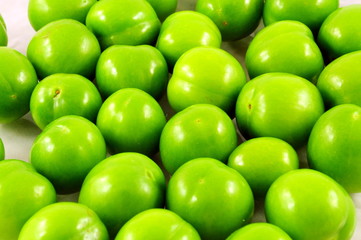 green plums as a background